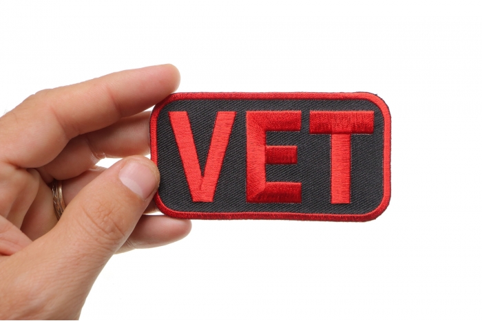 Vet Patch shown on hand for size comparison