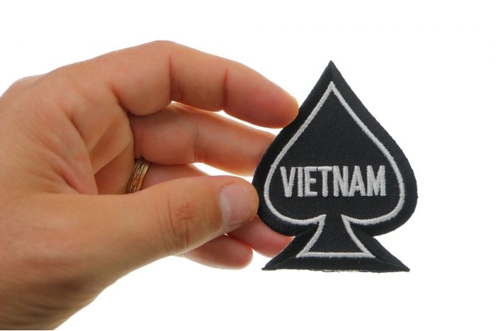 Vietnam Spade Patch shown on hand for size comparison