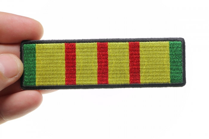 Vietnam Ribbon Patch shown on hand for size comparison