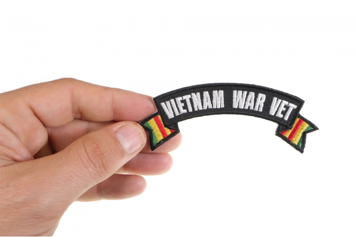 Vietnam War Vet Ribbon Small Rocker shown on hand for size comparison