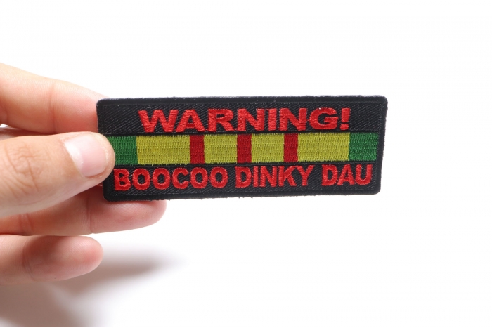Warning Boocoo Dinky Dau Patch, Military Saying Patches shown on hand for size comparison
