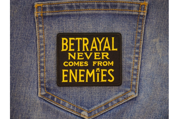 Betrayal Never Comes From Enemies Patch shown on jeans