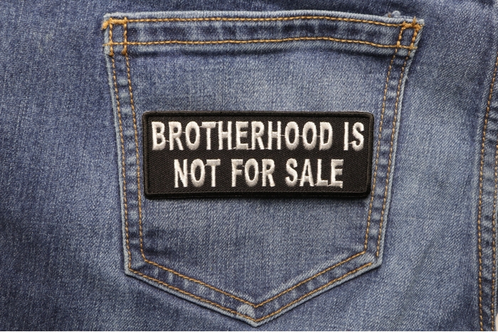 Brotherhood Is Not For Sale Patch shown on jeans