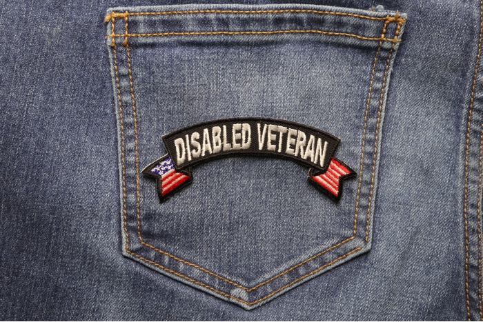 Disabled Veteran Patch with American Flag Tips shown on jeans