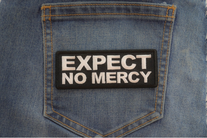 Expect no Mercy Patch shown on jeans