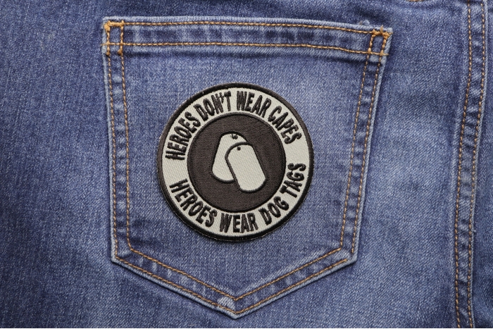 Heroes Don't Wear Capes Round Patch shown on jeans