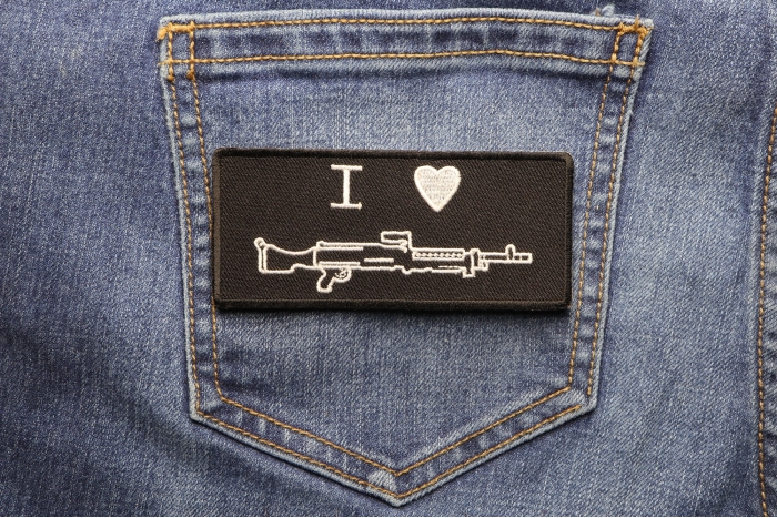 I Heart Machine Gun Patch shown on jeans