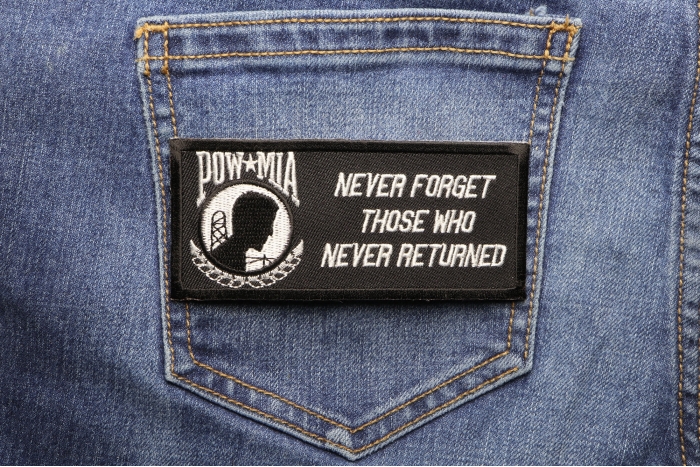 Never Forget Those Who Never Returned POW MIA Patch shown on jeans