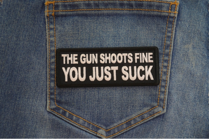 The Gun Shoots Fine You just Suck Patch shown on jeans