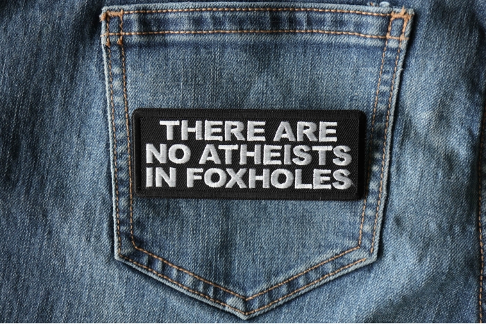 There are no Atheists in Foxholes Patch shown on jeans