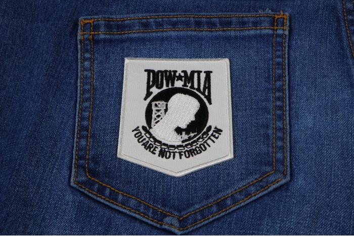 White POW MIA Iron on Patch shown on jeans