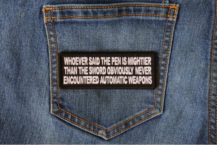 Whoever Said the Pen is Mightier than the Sword Obviously Never Encountered Automatic Weapons Funny Military Morale Patch shown on jeans