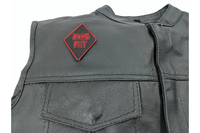 100 Percent Vet Patch - 3x2 inch. Embroidered Iron on Patch shown on leather vest