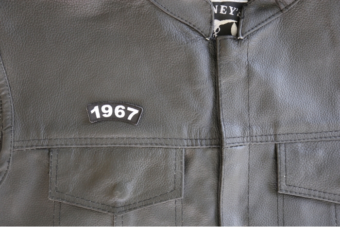 1967 Year Patch - 2.2x0.75 inch. Embroidered Iron on Patch shown on leather vest
