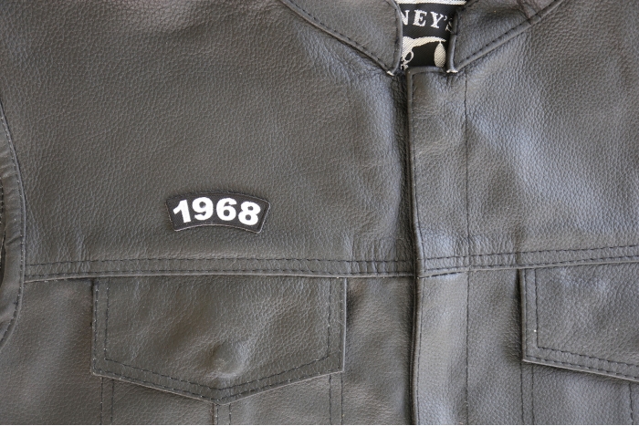 1968 Year Patch - 2.2x0.75 inch. Embroidered Iron on Patch shown on leather vest