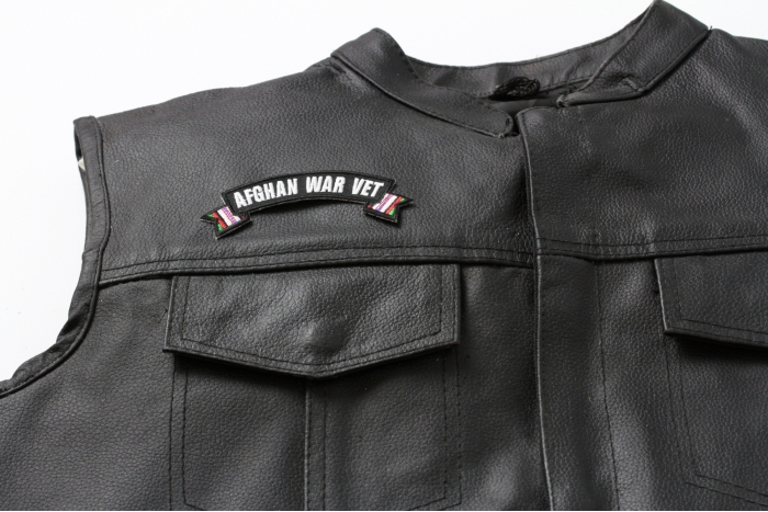 Afghan War Vet Small Ribbon Rocker - 4x1.5 inch. Embroidered Iron on Patch shown on leather vest