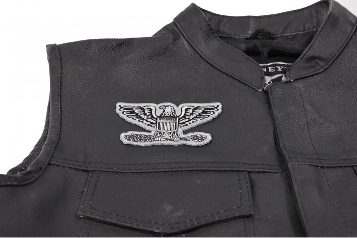 Colonel Eagle Insignia Patch - 4x2.1 inch. Embroidered Iron on Patch shown on leather vest