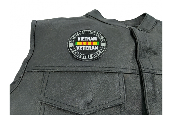 Don't Let The Gray Hair Fool You Vietnam Veteran Patch - 3x3 inch. Embroidered Iron on Patch shown on leather vest