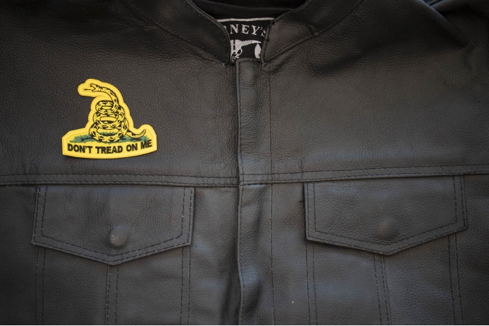 Don't Tread On Me Small Patch - 3x2.5 inch. Embroidered Iron on Patch shown on leather vest