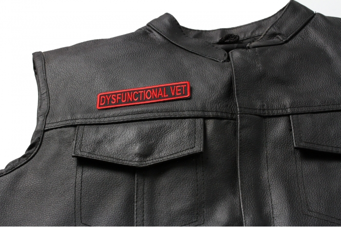 Dysfunctional Vet Patch - 4x1 inch. Embroidered Iron on Patch shown on leather vest