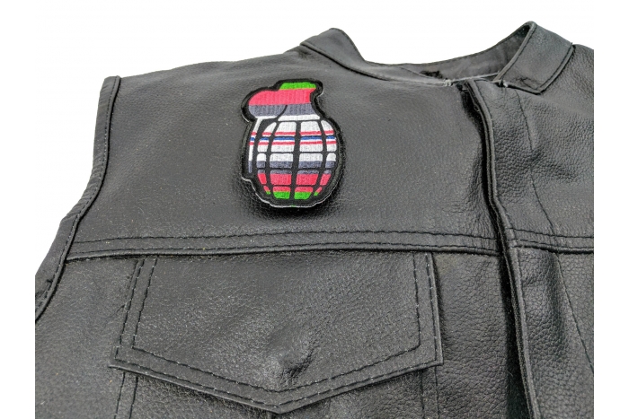Grenade Patch Afghanistan Colors - 2.25x3.5 inch. Embroidered Iron on Patch shown on leather vest