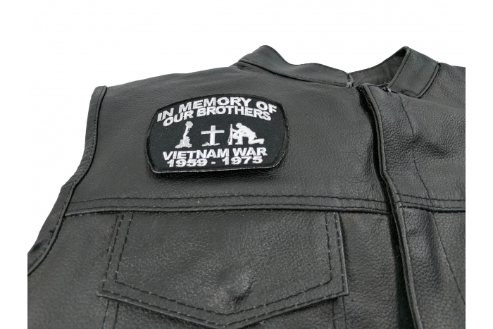 In Memory Of Our Brothers Vietnam War Patch - 4x3 inch. Embroidered Iron on Patch shown on leather vest
