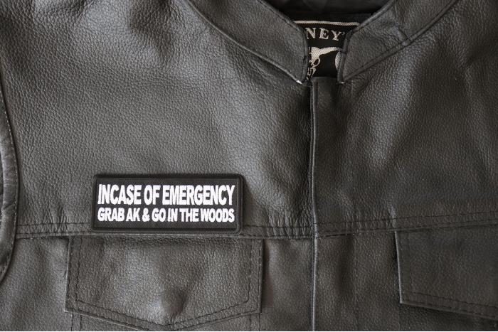 Incase of Emergency Grab AK and Go in The Woods Patch - 4x1.5 inch - Embroidered Iron on Patch shown on leather vest