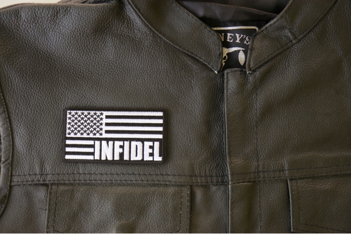 Infidel American Flag Black White Patch - By Ivamis Trading - 3.75x2 inch shown on leather vest