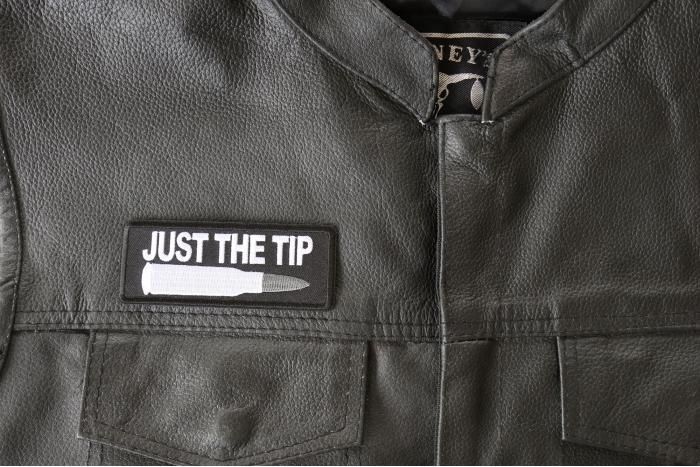 Just The Tip Bullet Patch, Funny Saying Patches shown on leather vest