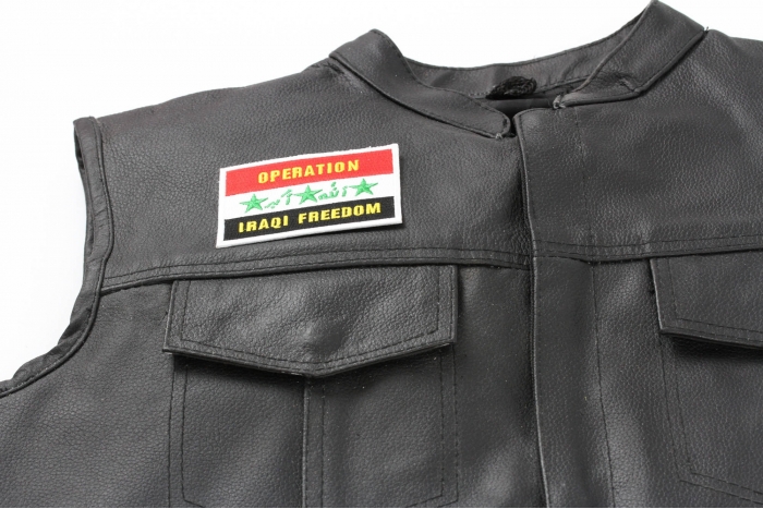 Operation Iraq Freedom Patch - 3x2 inch. Embroidered Iron on Patch shown on leather vest