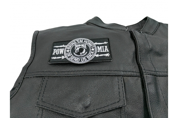 POW MIA Barbwire Patch - 4.5x2.5 inch. Embroidered Iron on Patch shown on leather vest