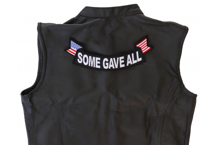 Some Gave All Patch, US Flag Large Rocker Patch shown on leather vest