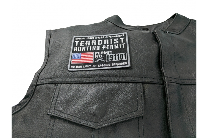 Terrorist Hunting Permit Patch - 3.75x3 inch. Embroidered Iron on Patch shown on leather vest