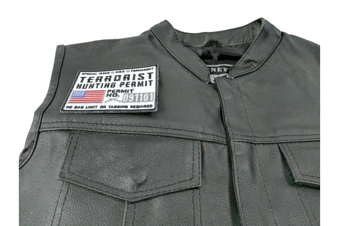 Terrorist Hunting Permit White Patch - 3.75x3 inch. Embroidered Iron on Patch shown on leather vest