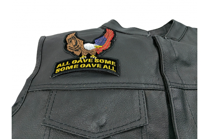 US POW MIA Upwing Eagle Rocker Small Patch - 4x5 inch. Embroidered Iron on Patch shown on leather vest