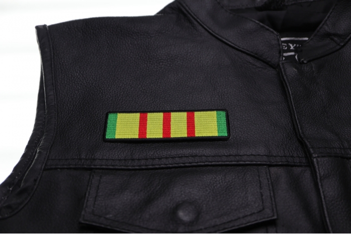 Vietnam Ribbon Patch - 4x1 inch. Embroidered Iron on Patch shown on leather vest