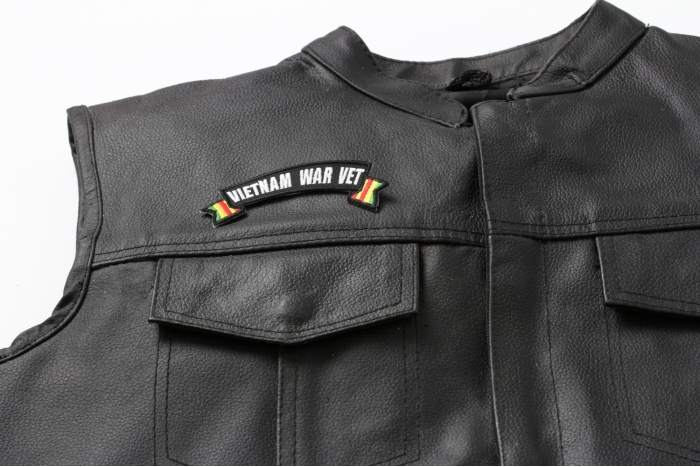 Vietnam War Vet Ribbon Small Rocker - 4x1.5 inch. Embroidered Iron on Patch shown on leather vest