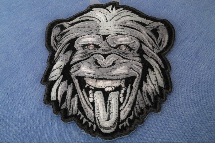 Party animal Monkey Iron on Patch diagonal view
