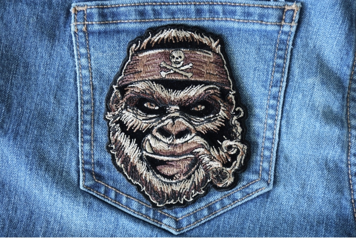 Cigar Smoking Gorilla Patch with Skull Headwrap shown on jeans