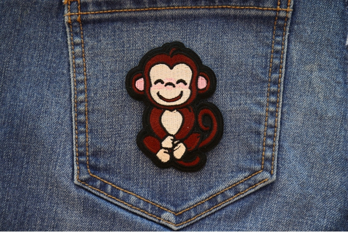 Cute Monkey Iron on Patch shown on jeans