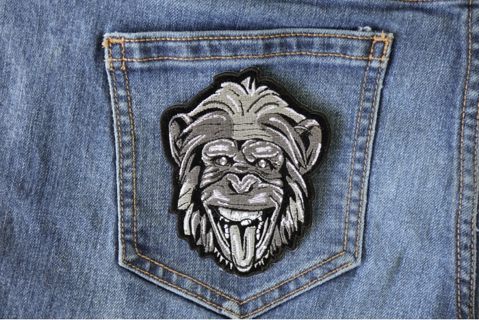 Party animal Monkey Iron on Patch shown on jeans