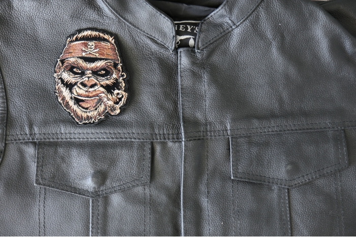 Gorilla Patch with Skull Headwrap - 3.5x4.4 inch - Embroidered Iron on Patch shown on leather vest