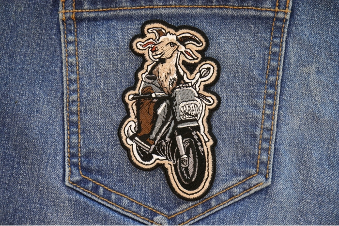 Goat on Bike Patch shown on jeans