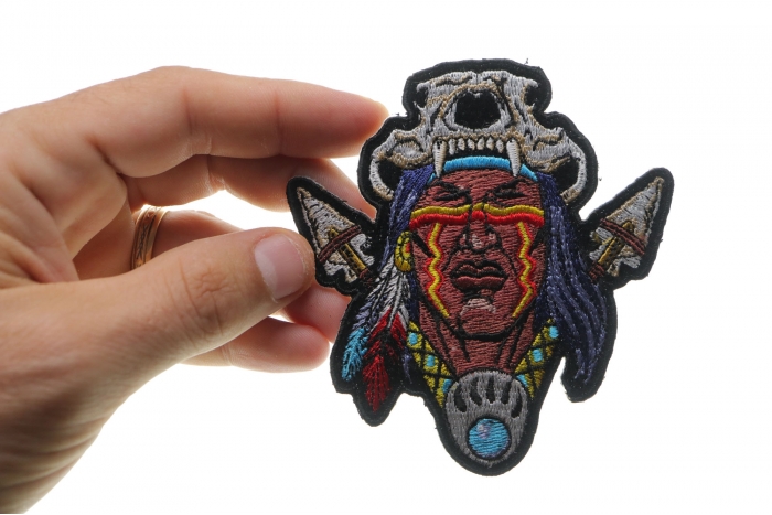 Indian with Arrows and Bear Skull Patch, Skull Patches shown on hand for size comparison
