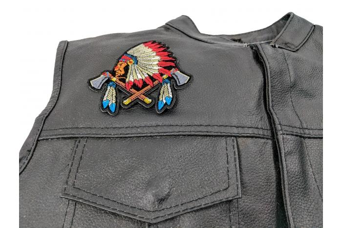 Small Indian Patch With Battle Axes and Feathers - 4x4 inch. Embroidered Iron on Patch shown on leather vest