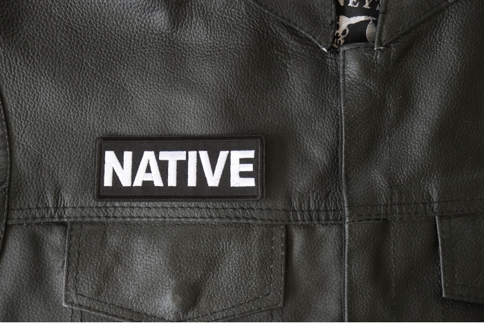 Native Patch - 4x1.5 inch - Embroidered Iron on Patch shown on leather vest