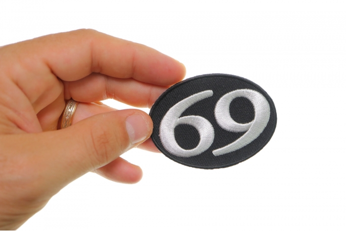 69 Patch, Iron on Patch, Embroidered shown on hand for size comparison