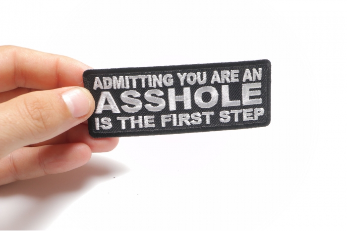 Admitting You Are an Asshole is The First Step Funny Iron on Patch shown on hand for size comparison
