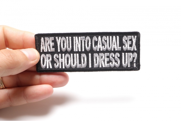 Are You Into Casual Sex or Should I Dress Up Funny Naughty Patch shown on hand for size comparison