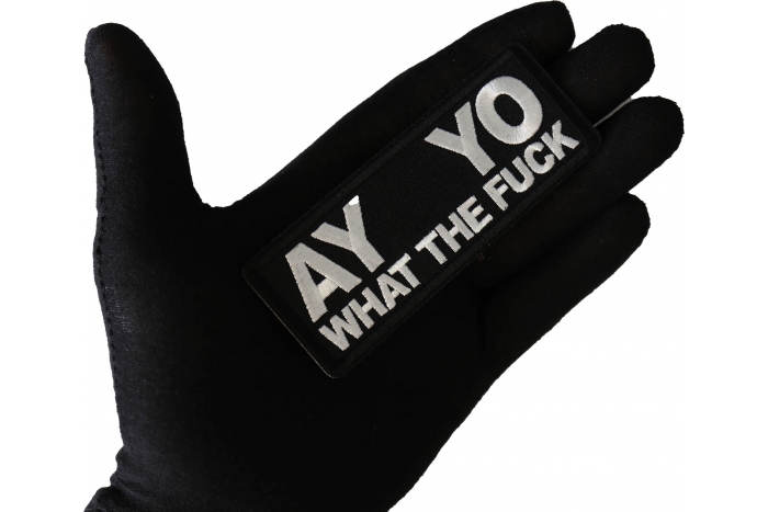 Ay Yo What the Fuck Patch shown on hand for size comparison